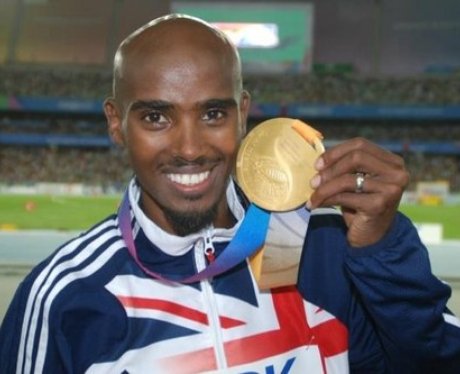 Mo Farah Holding His London 2012 Olympics Gold Medal