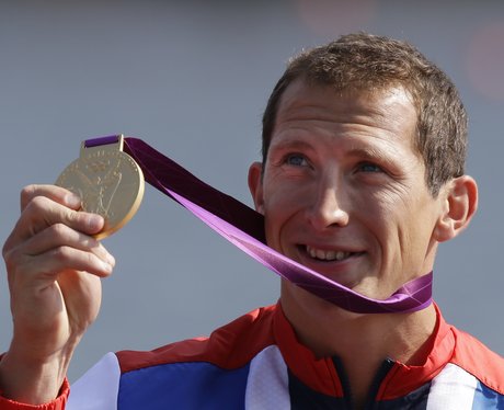 Ed McKeever displays his gold medal