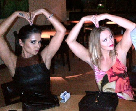 Cheryl Cole and Kimberley Walsh do Mo Farah's pose.