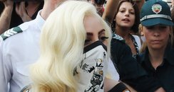 Lady Gaga wears a mask