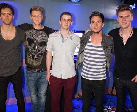 Lawson pose with one of their fans after live performances of songs ...