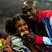 Image 4: Mo Farah and daughter with gold medal