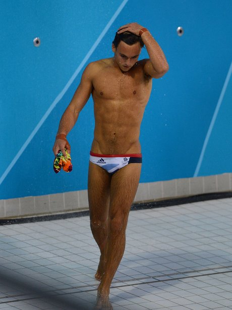 Tom Daley holding his head after Olympics dive