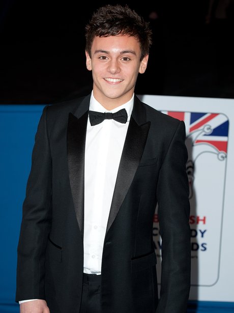 Tom Daley wearing a suit at the British Comedy Awards