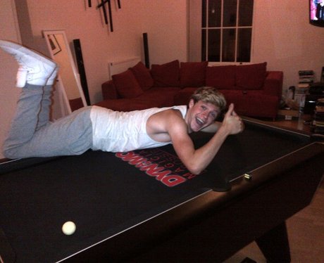 Niall Horan plays pool