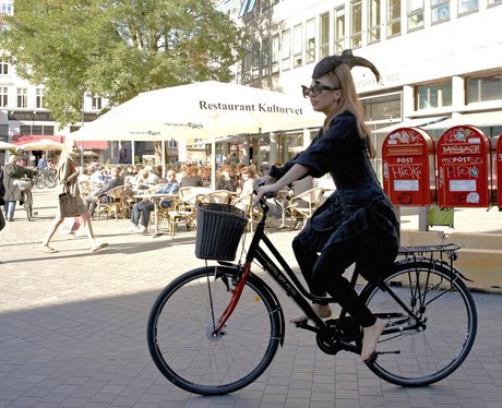 Lady Gaga riding a bike