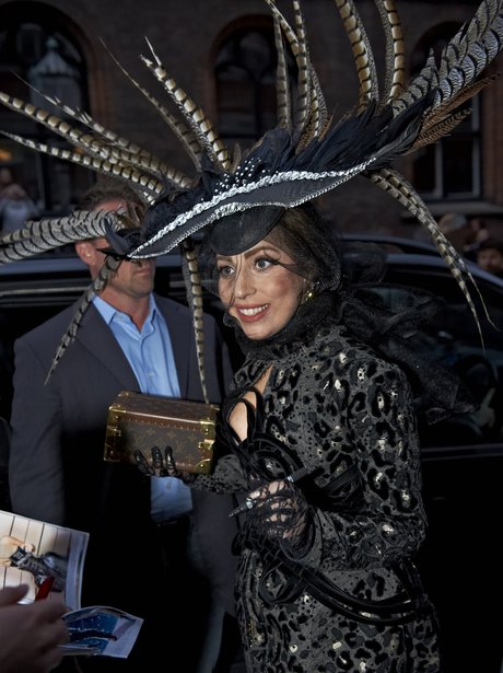 Lady Gaga wears feathered hat in Denmark.