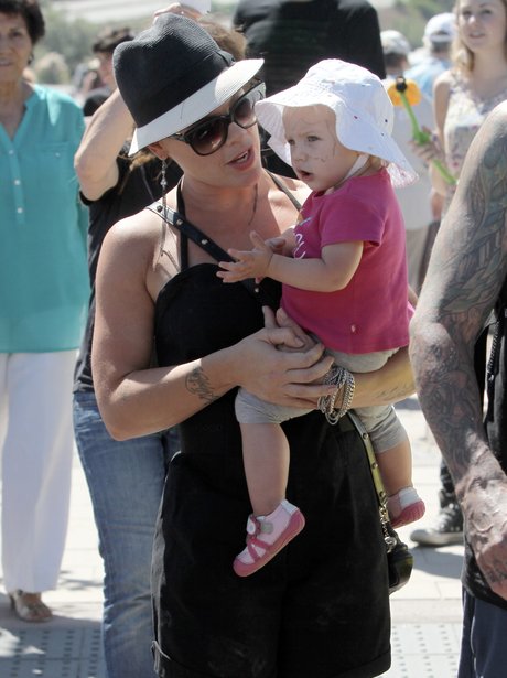 Pink carrying baby daughter Willow