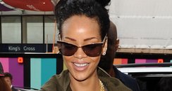 Rihanna arrives at St pancras station smiling
