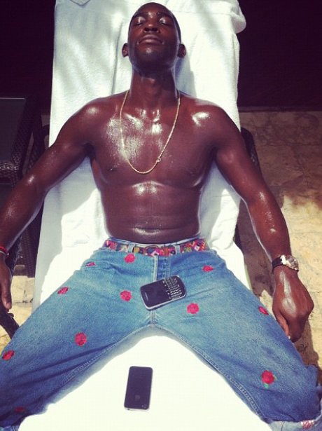 Tinie Tempah sunbathing