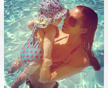 Una Healy in the pool with baby Aoife