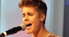 Justin Bieber performs an accoustic concert