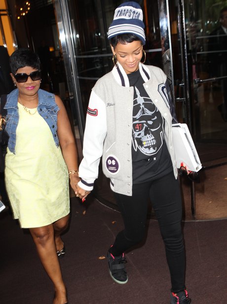 Rihanna with mum heading to London airport.