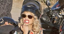Rita Ora on a motorbike
