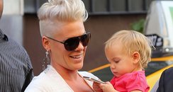Pink's daughter Willow plays with Pink's iPhone
