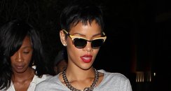 Rihanna wearing a tight grey dress in Hollywood