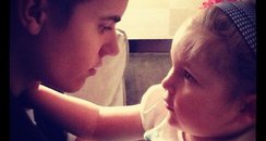 Justin Bieber with his baby sister