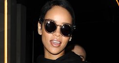 Rihanna wearing sunglasses at the airport