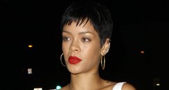 Rihanna out for dinner in black and white dress