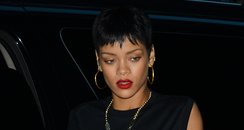 Rihanna wearing snakeskin boots in New York