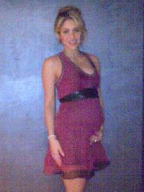 Shakira shows off her baby bump.