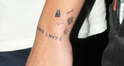 Harry Styles new tattoos