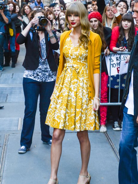 Taylor Swift wearing a yellow dress in New York