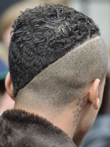 Aston Merrygold's shaved head.