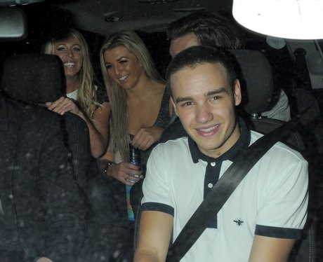 Liam Payne gets a taxi with two girls..