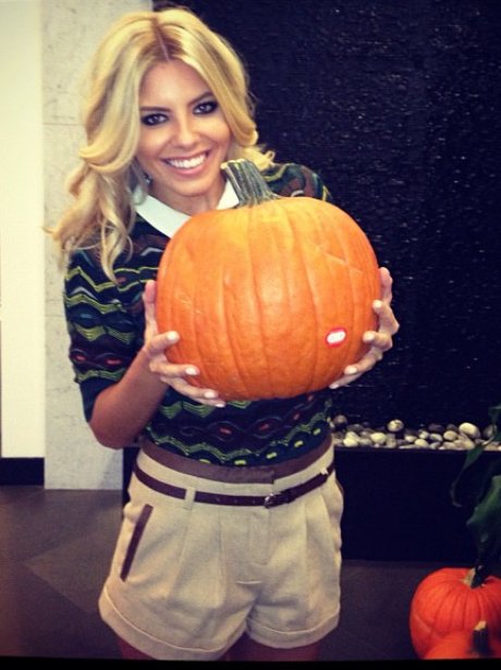 Mollie King with a pumpkin