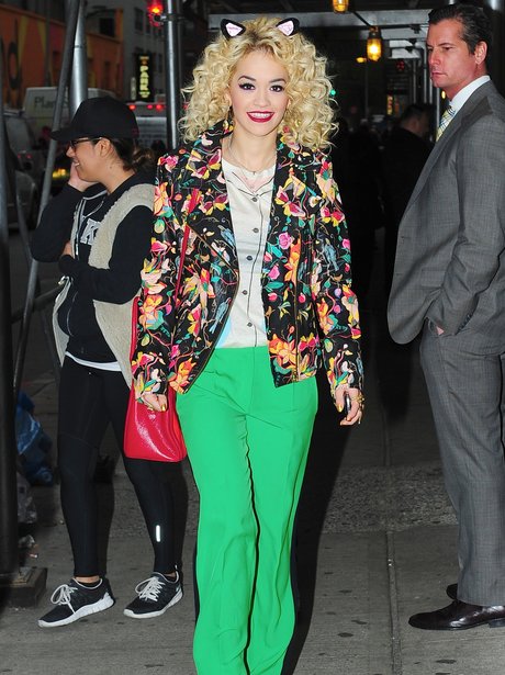 Rita Ora wearing cat ears.