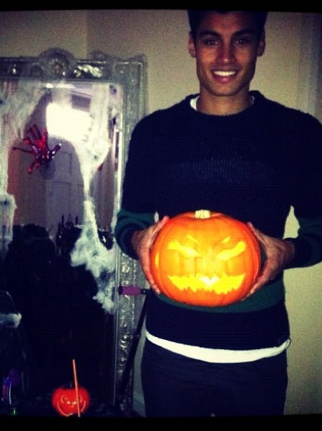 Siva from The Wanted holding a pumpkin