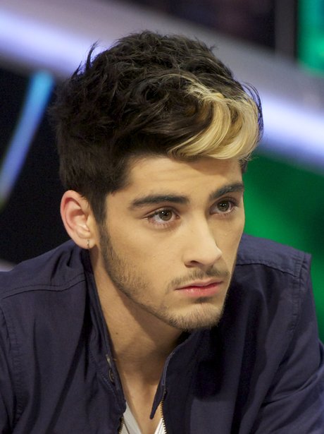 Zayn poses with his newly blonde hair quiff and designer stubble... now ...