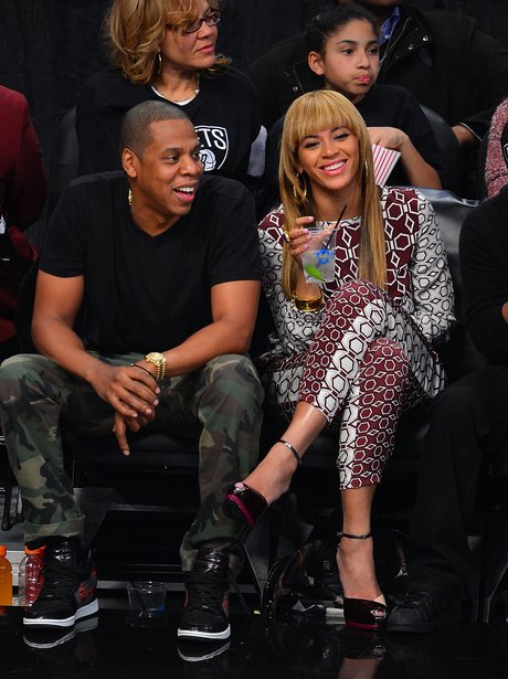 Jay-Z and Beyonce Knowles at a basketball game