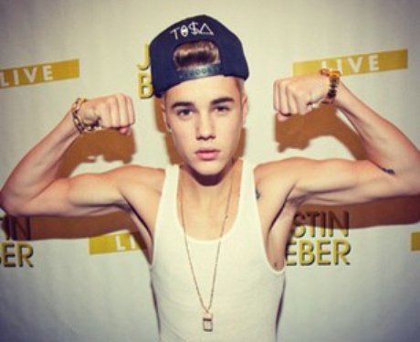 Justin Bieber wearing a vest