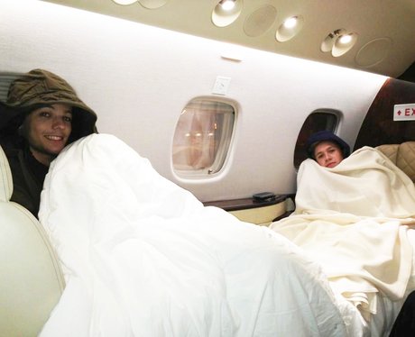 Niall Horan and Louis Tomlinson on a plane.