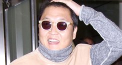 PSY arrives in London