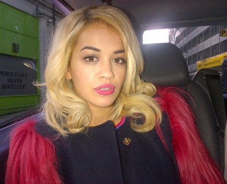 Rita Ora in a taxi.