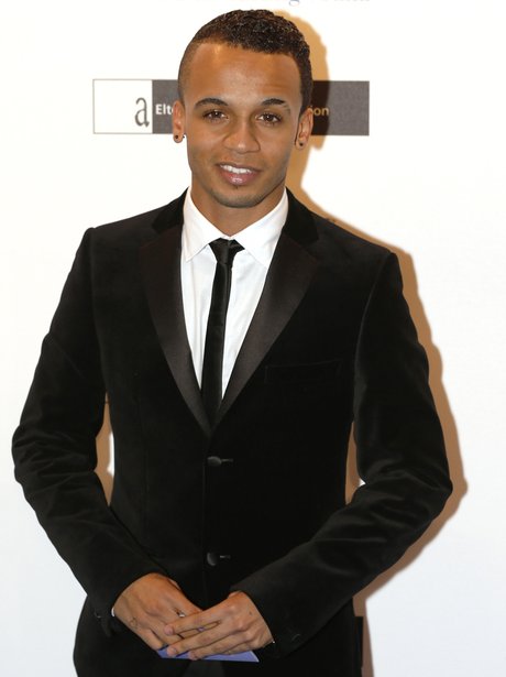 Aston Merrygold in a suit