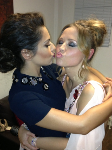 Cheryl Cole and Kimberley Walsh share a kiss backstage