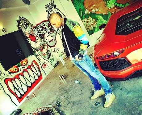 Chris Brown with his red car