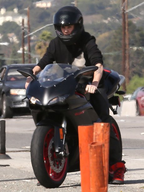 Justin Bieber on a motorbike