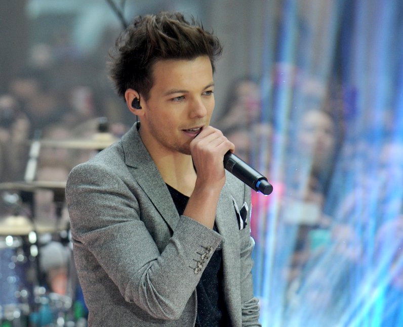 Louis Tomlinson of One Direction performs on NBC's