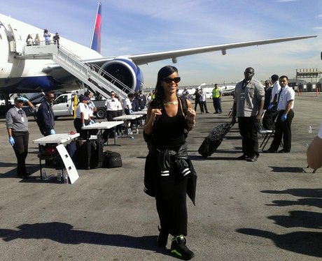 Rihanna by her plane on 777 world tour