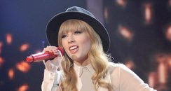 Taylor Swift performs on the American X Factor