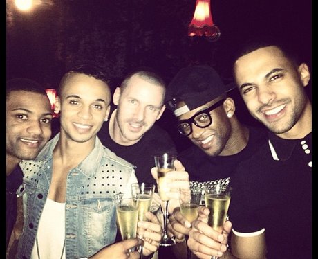 JLS drinking champagne