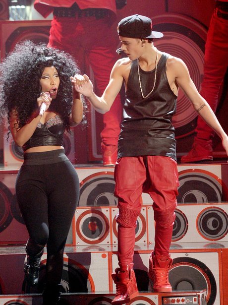 Nicki Minaj (L) and Justin Bieber perform onstage