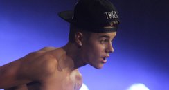 Justin Bieber performs topless