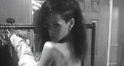 Rihanna tweets a picture of herself topless