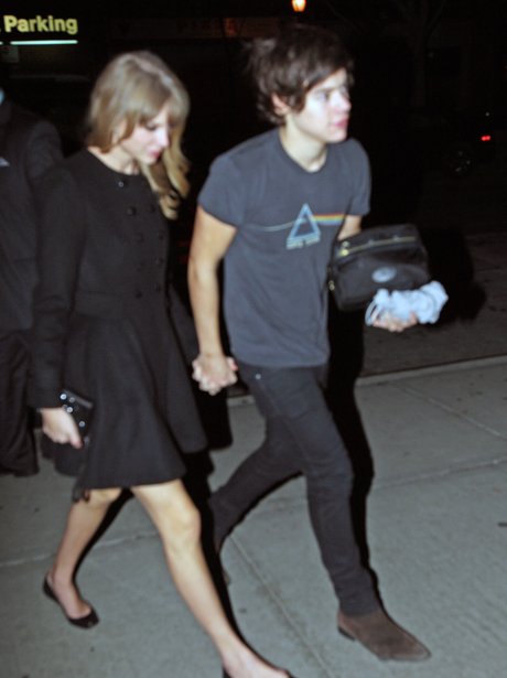 Harry Styles and Taylor Swift holding hands